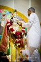 Pujya Deepakbhai Offering Makhan (Indian Butter) to Lord Shree Krishna